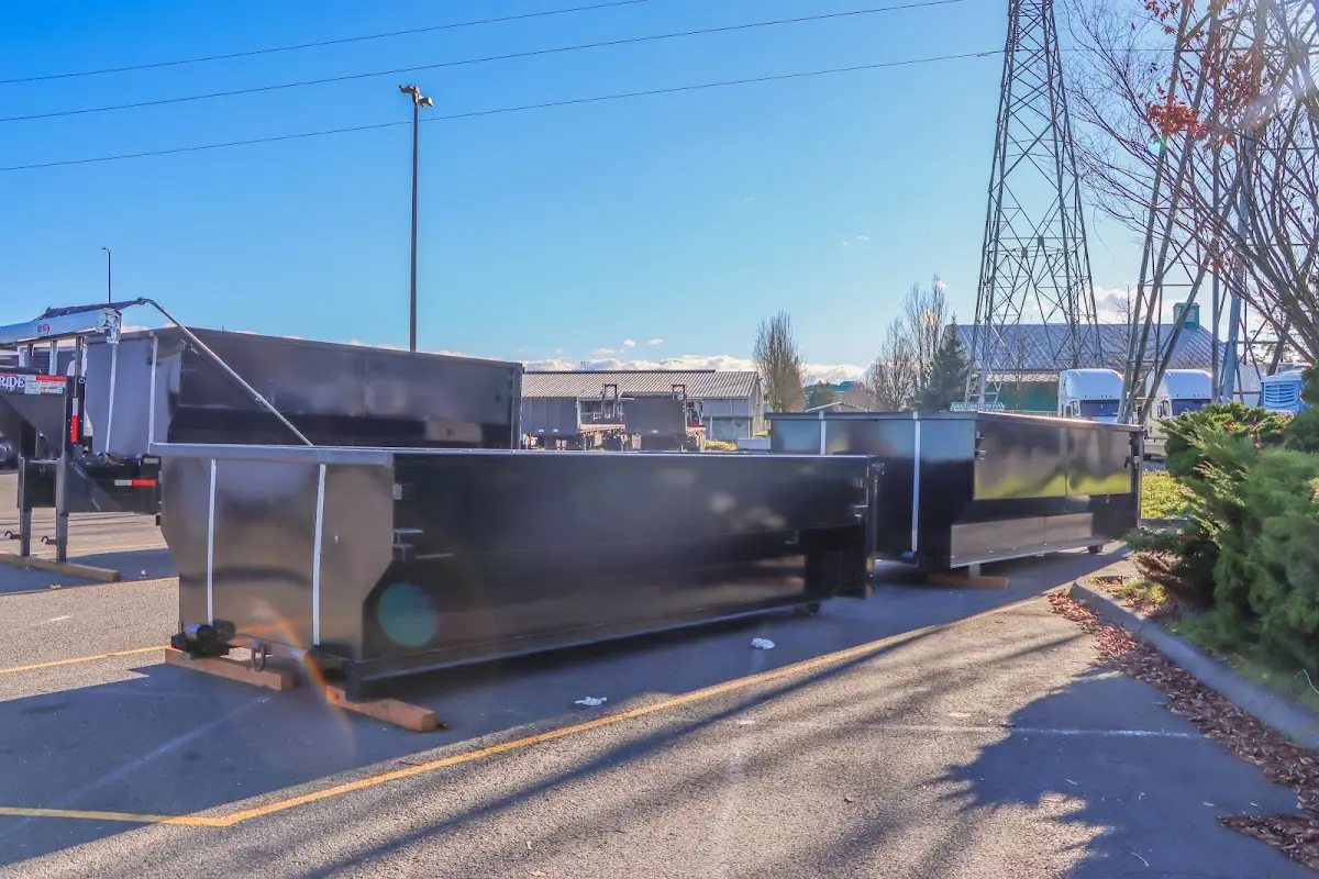 Roll-off dumpster ready for waste disposal at job site for 12 Yard Dumpster Rental in Port Orchard